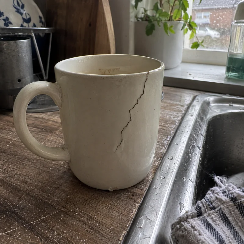 Studio concept: source photograph of an old mug with a distinctive zigzag crack